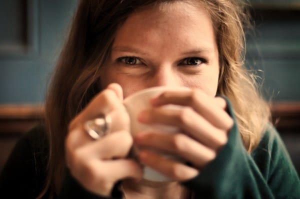 1-portrait-of-smiling-woman-drinking-coffee